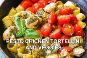 Pesto Chicken Tortellini and Veggies Recipe Easy Quick PESTO CHICKEN TORTELLINI AND VEGGIES centered hero view, clean and uncluttered