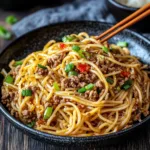 ASIAN GROUND BEEF NOODLES centered hero view, clean and uncluttered