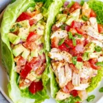 BLTA CHICKEN SALAD LETTUCE WRAP centered hero view, clean and uncluttered