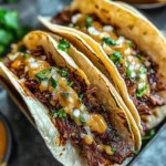 GARLIC BUTTER HONEY BBQ BEEF TACOS centered hero view, clean and uncluttered