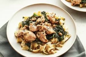 ROTISSERIE CHICKEN AND GREENS PASTA centered hero view, clean and uncluttered