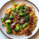 BEEF AND BROCCOLI LO MEIN NOODLES centered hero view, clean and uncluttered