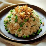 SPRING PEA PULAO RICE CRISPY SHALLOTS recipe, served and ready to eat, easy homemade dinner