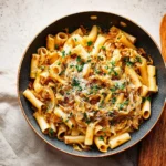 CARAMELIZED CABBAGE BUTTER PASTA recipe, served and ready to eat, easy homemade dish