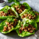SESAME CHICKEN LETTUCE CUPS recipe, served and ready to eat, easy homemade dish